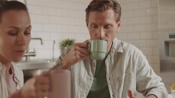 Girlfriend Sharing Pastry with Man