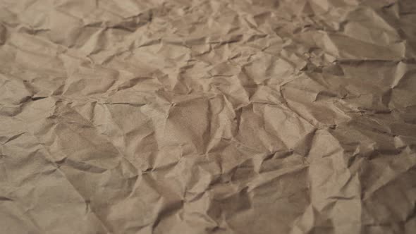 Crumpled Wrapping Paper. Brown old material. 