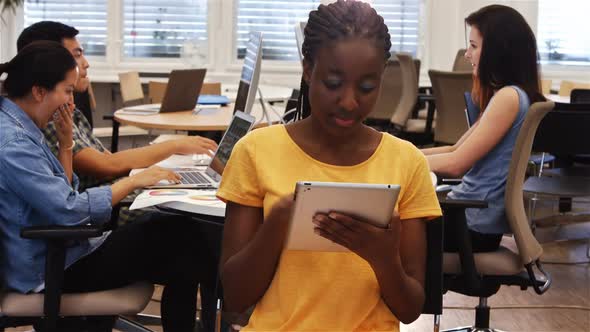 Woman using digital tablet