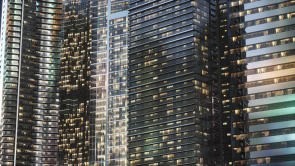 Aerial View of Glowing High Rise Buildings Big City