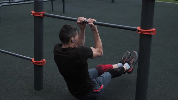 Man training outdoors on sports field