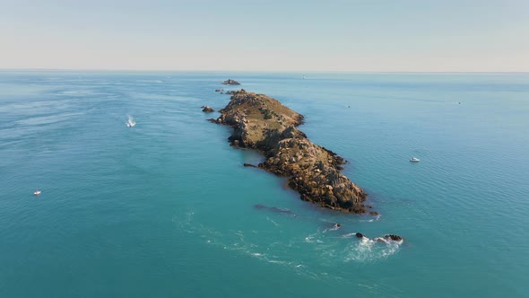 A magnificent small island near a coast in France. Seen from above.