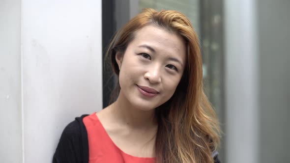 Portrait of smiling young woman