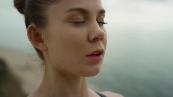 Yoga Woman Breathing Calmly Meditating on Seaside Close Up