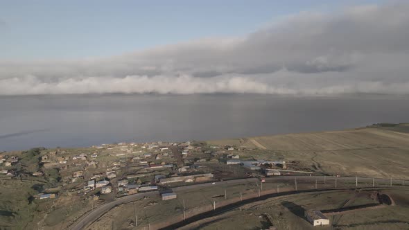 Aerial view of Lake Paravani and the village Poka. Georgia