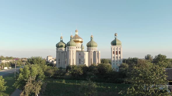 White Orthodox Church on Blue Sky Background alt