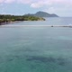 A Long Pier Extending out into Tropical Waters Aerial - VideoHive Item for Sale