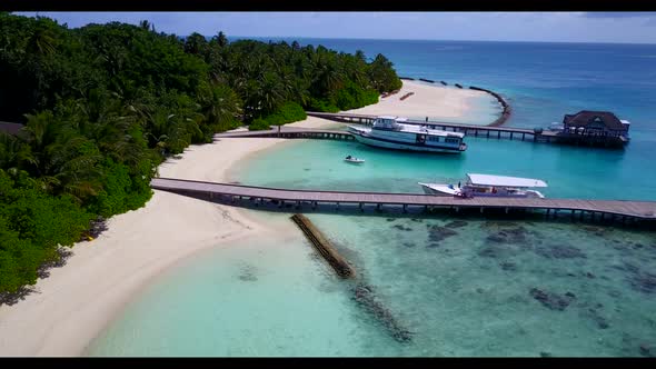 Aerial seascape of relaxing sea view beach holiday by transparent lagoon with white sand background 