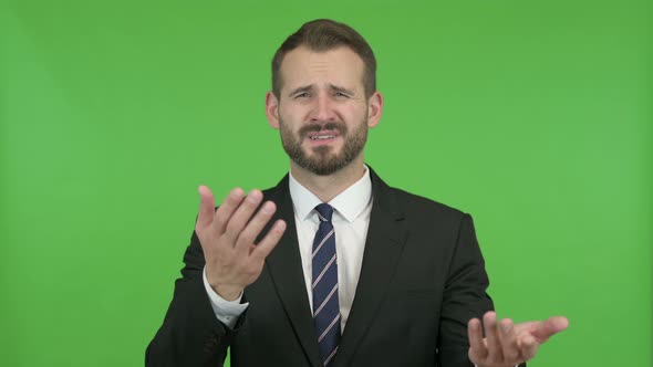 Ambitious Businessman Getting Upset Against Chroma Key