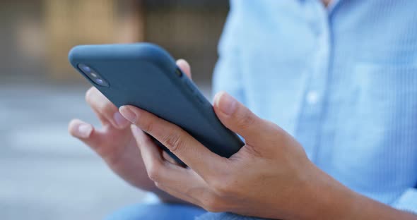 Close up of woman use of mobile phone