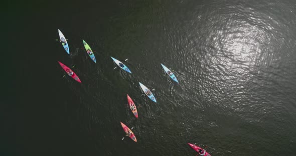 Top Down Aerial Pan Around of Kayakers on a Lake
