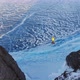 Tightrope Walker on the Background of Blue Ice Frozen Lake. - VideoHive Item for Sale