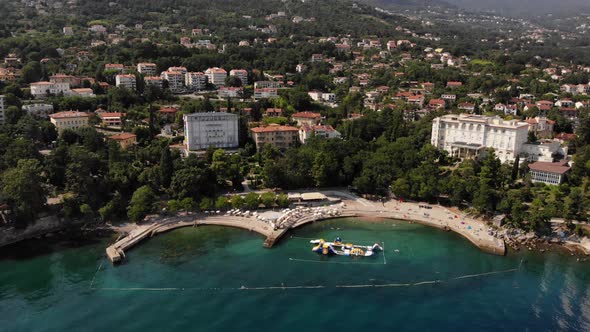 View of the beach and blue sea coast of Lovran, Croatia