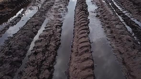 Dirty Road with Wheel Trace from Tyre Car and Truck