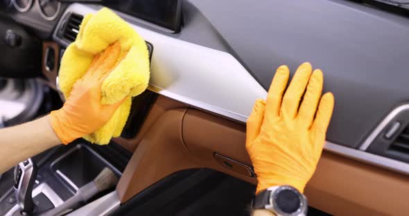 Gloved Technician Wipes Dashboard in Car with Microfiber  Movie