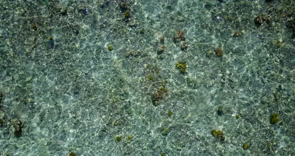 Luxury fly over abstract view of a white sand paradise beach and turquoise sea background in colorfu