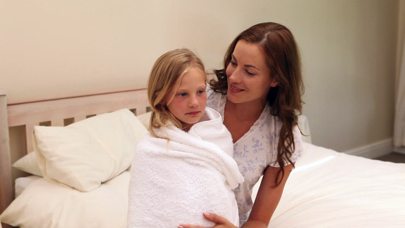 Mother Sitting With Her Little Girl