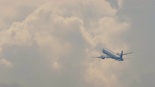 Airplane Silhouette in Stormy Rainy Sky