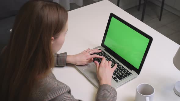 Businesswoman Working on Laptop Green Screen Chromakey