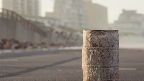 Old Rusty Metal Barrel on the Street alt