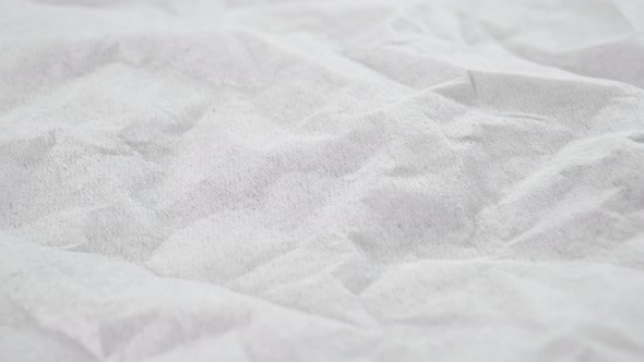 Wrinkled paper white facial tissue