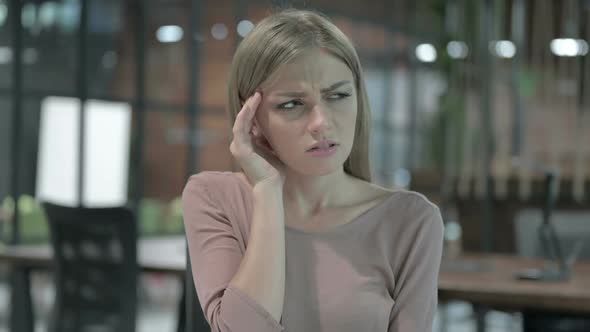 Portrait Shoot of Stressed Woman Having Headache