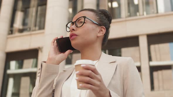Businesswoman Talking on Phone Outdoors