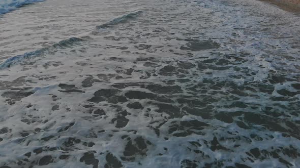 Top View of Beautiful White Sand Beach with Turquoise Ocean Water in the Aerial Drone