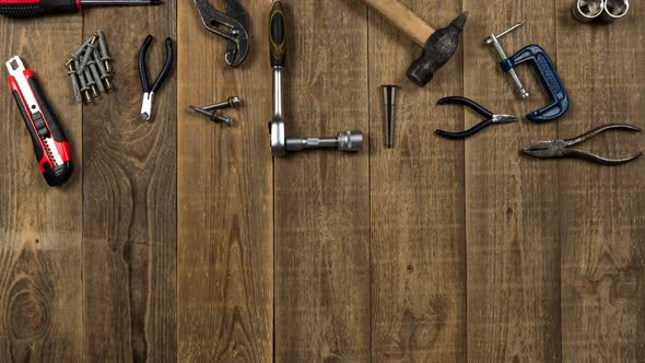 Hand Tools Animation on Wooden Table for Brand Logo on White Sheet