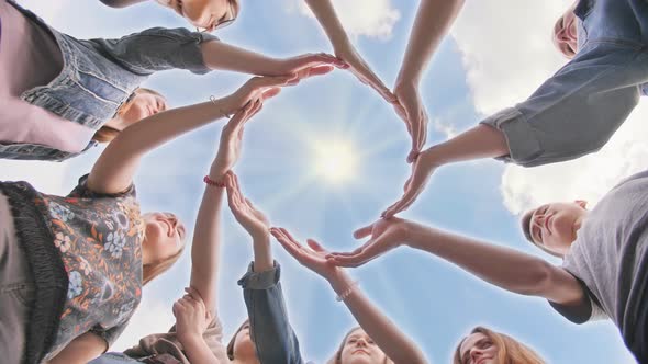 Conceptual Symbol of Cooperation Diverse Hands Making a Circle. Students Help Each Other