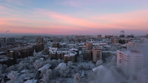 Flying Over a City in Eastern Europe in Winter