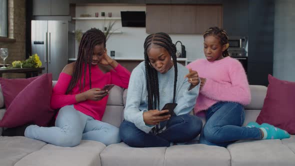 Addicted to Cellphones Teenage Girls Phubbing Each Other Indoors