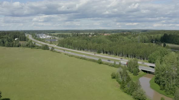 Fast aerial shot of vehiclesing quickly on a Finnish motorway in Kerava.