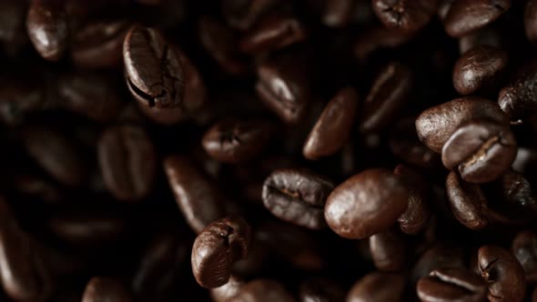 Super Slow Motion Shot of Exploding Premium Coffee Beans Towards the Camera at 1000Fps