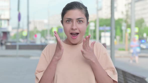 Portrait of Excited Indian Woman Celebrating Success