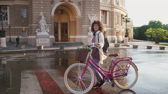 Africanamerican Female in Casual Outfit and Backpack