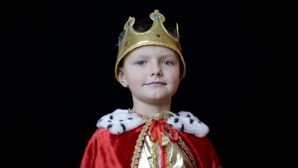 Emotional Little Boy is Singing Into a Microphone Like a Rock Musician