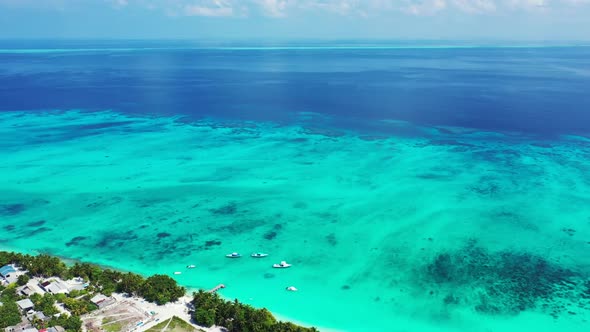 Aerial abstract of beautiful coastline beach lifestyle by blue water with clean sandy background of 