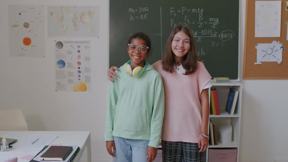 Portrait of Happy Schoolgirls in Classroom