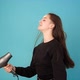Lady Brunette Sings Into Hairdryer - VideoHive Item for Sale
