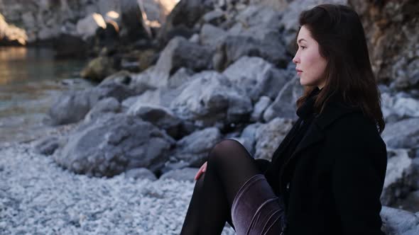 A Beautiful Young Asian Woman on the Seashore