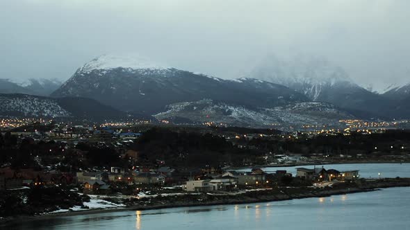 Mist rolling over Snow Covered Patagonian Mountains in Ushuaia, Argentina.