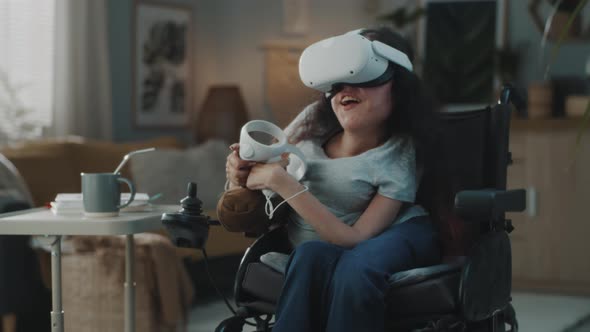 Woman in a Wheelchair Experiencing VR Glasses