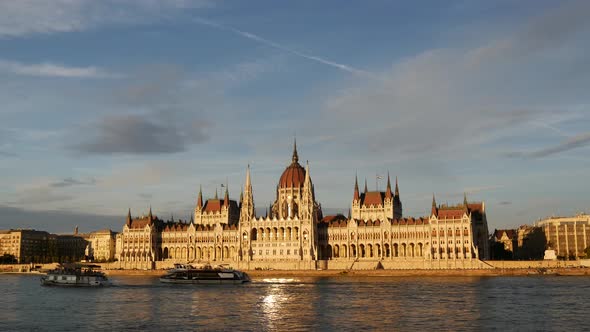 Sunset time lapse from cruise ships and ferries with the Hungarian Parliament Building