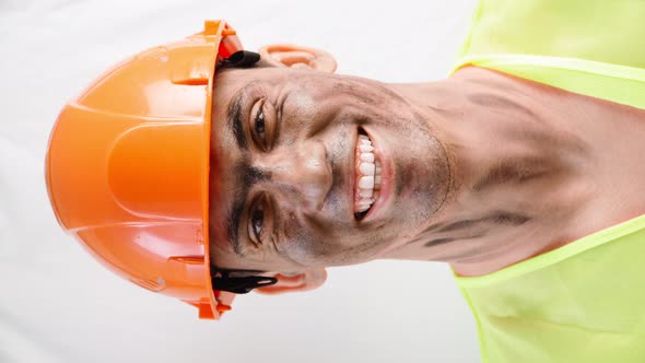 Portrait Mixed Race Guy with Dirty Face in Work Hard Hat Smiles Snowwhite Smile