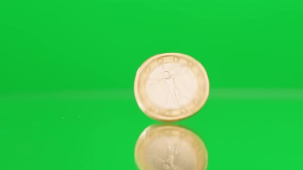 Two Euro Coin Isolated on Green Chroma Key Background Closeup Rotating