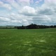 Flying over a green field 4K - VideoHive Item for Sale