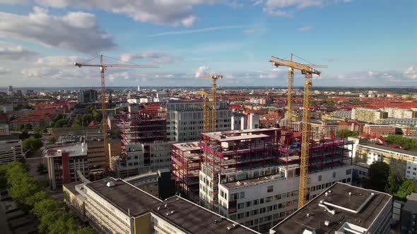 Drone looping around construction project in Malmö, Sweden