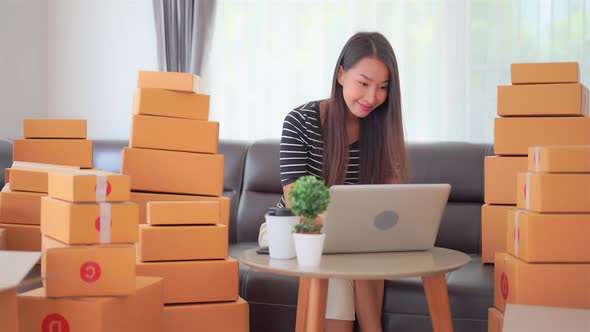 Woman with packing box ready for shipping