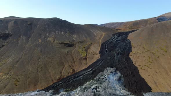 Aerial view of Natthagi valley filed with lava from erupting volcano, Iceland